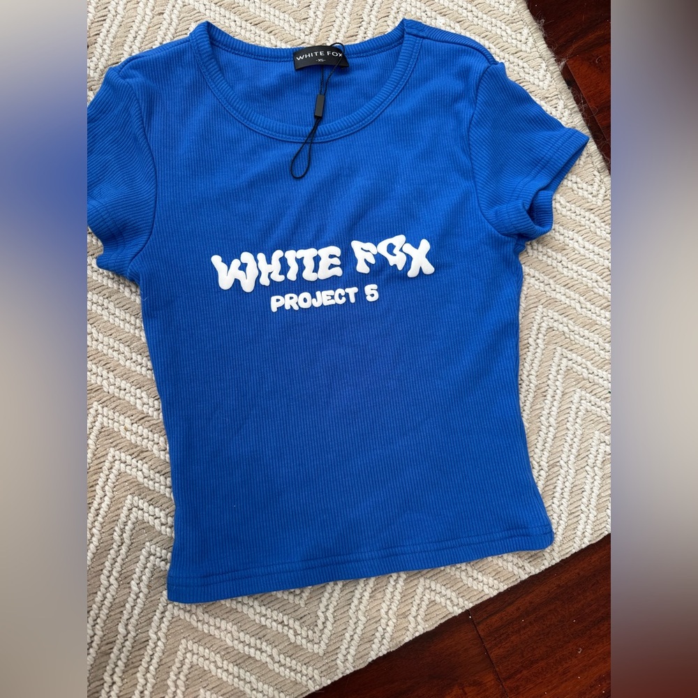 White Fox blue top
New without tags